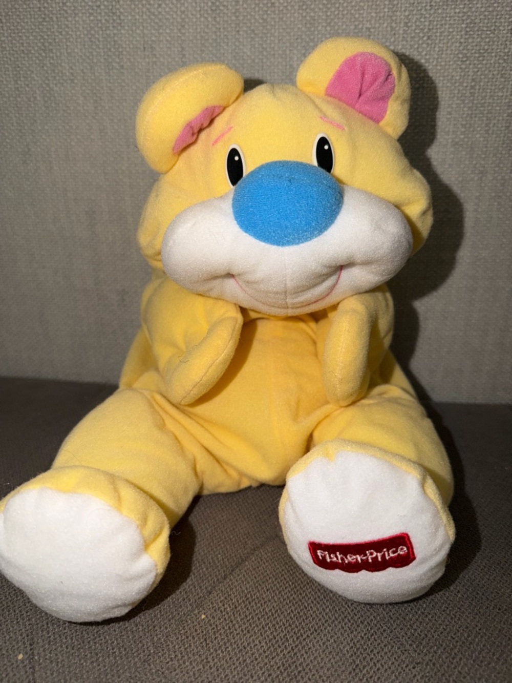 Fisher-Price Yellow with blue nose rumple bear. 1998